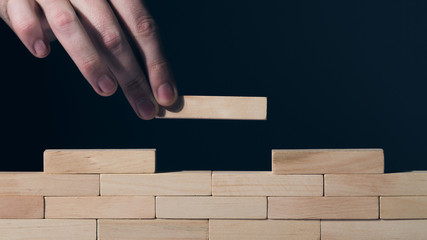 Construction concept Wooden puzzles