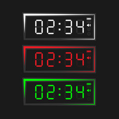 Colored electronic clock in square shape. Clock with light on a black background.