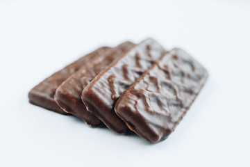 Close up of chocolate biscuits on white background