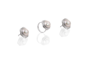 Platinum precious earrings ring with big pearls on white isolated background.
