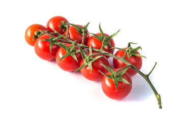 Bunch of red tasty fresh tomatos on the white background