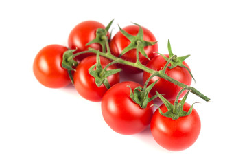 Bunch of red tasty fresh tomatos on the white background