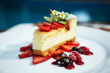 cake with strawberries and forest berries