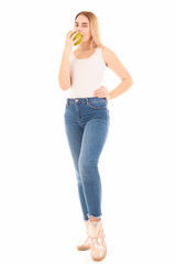 Pretty young girl with green apple, studio  