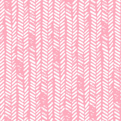 Cute seamless pattern. Pink and white colors. Grunge texture. Knitted ornament, braids, herringbone. Prints for textiles.