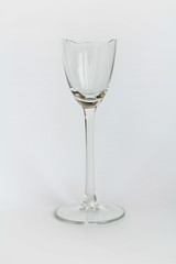 Standing broken wine glass isolated on white background