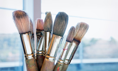 paintbrushes in painter studio