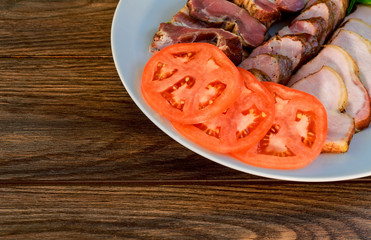 Assorted deli meats - ham, sausage, salami, parma, prosciutto