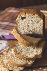 large knife sliced fresh bread slices