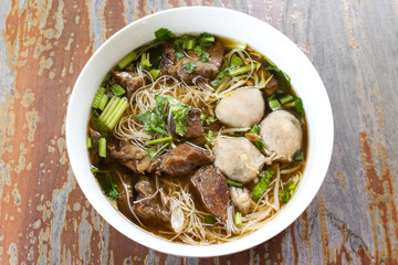 Meat Noodle. Beef and meat ball with noodle. Top view on wooden table.