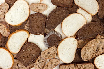 Sliced white and brown loaf of bread