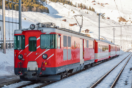 "Matterhorn Gottharn" railways train waiting in Dieni train station in Switzerland