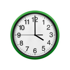Green wall clock isolated on a white background.