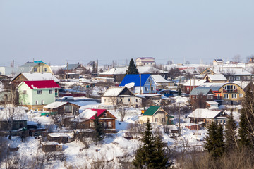 Obraz premium beautiful country houses on a winter sunny day