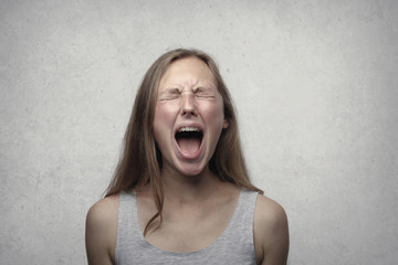 Angry girl screaming