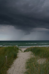 Heavy, rainy dark clouds on the coast