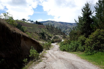Fototapeta na wymiar A mountain track winds through the Ecuadorian Andes on the Quilotoa Loop hike