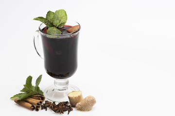 Cinnamon sticks, mint, anise, ginger, apple slices and carnation