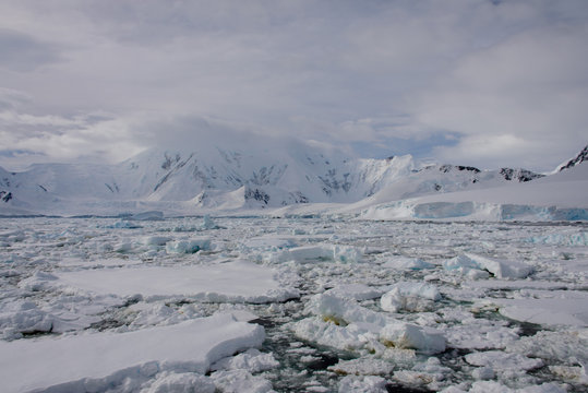 Antarctic landscape with glacier and mountains