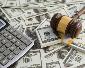 Fototapeta premium Gavel hammer judge money dollar calculator. financial concept, bribe, corruption. Business, court, law. Arrival and punishment