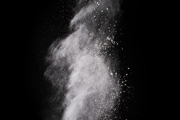 White powder on black background.