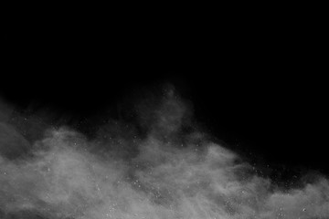 White powder on black background.