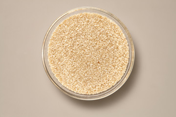 Whole Grains. Top View of Healthy grain foods in a Glass bowl on grey background with Real Shadow.