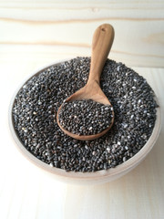 Chia seeds in a wooden bowl