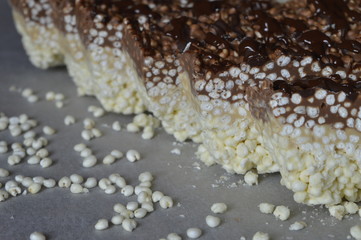 Homemade chocolate bars with expanded millet gruel in three colors