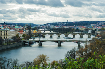 Fototapeta na wymiar Panorama of Prague from the Letna park on the river Vltava and bridges. Czech Republic.