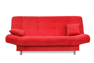 Modern red sofa with pillows isolated on white background.