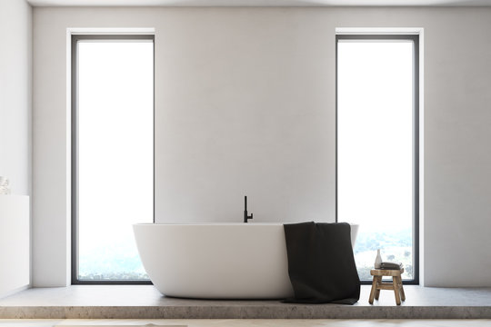 Minimalistic bathroom, white tub