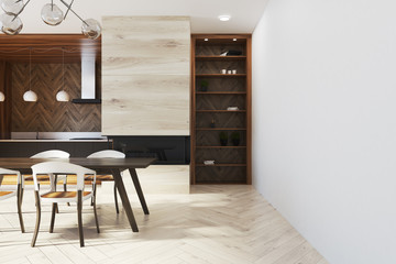 Dark wooden dining table with design chairs