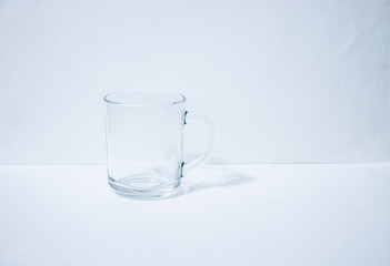 One empty glass beaker - Powered by Adobe