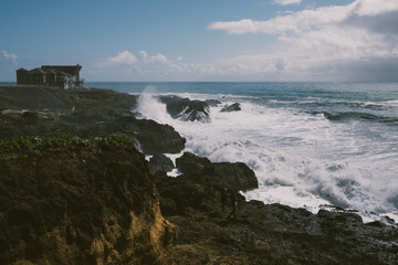 waves crasing against cliffs