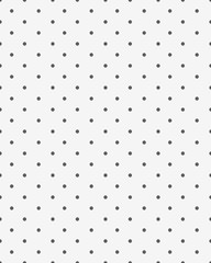 Seamless background with black dots on a gray background