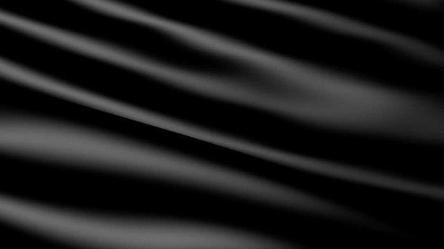 Fabric black background in motion. Smooth waves of matter waving from the wind. The canvas develops shimmering.   