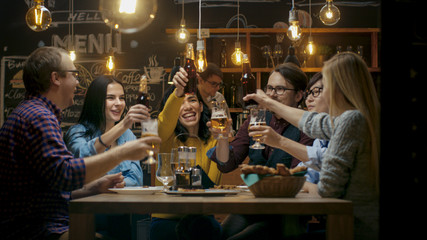 Diverse Group of Friends Celebrate with a Toast and Clink Raised Glasses with Various Drinks in...