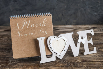 love lettering, Notepad on wooden background