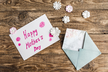 white envelope with flowers on white background.