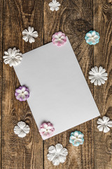white envelope with flowers on white background.