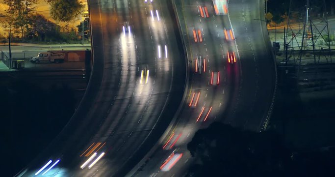 Aerial view night traffic freeway in Los Angeles, California. 4K UHD Timelapse