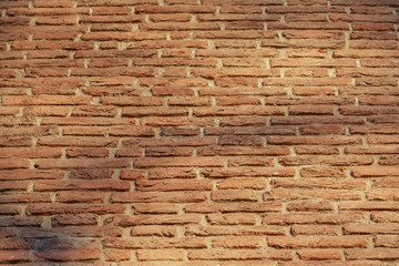 red brick wall texture grunge background with vignetted corners, may use to interior design