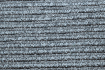 Texture by discoloured gray woven fabric, with lights.