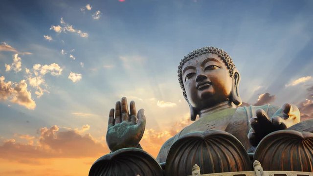 Tian Tan Buddha statue Hong Kong Sunset sky background rays sun clouds 4K UHD