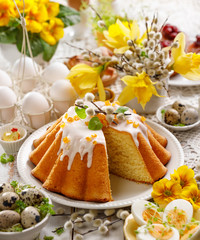 Easter yeast cake with icing and candied orange peel, delicious Easter dessert, traditional Easter pastries in Poland