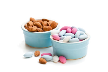 Sugared  almonds on white background. Christmas dessert.