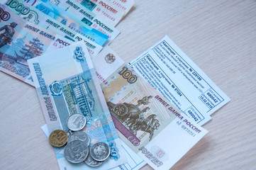 Russian money and pension receipts lie on the table
