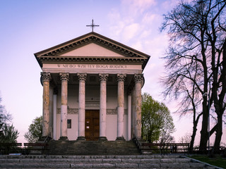 Obraz premium A beautiful old church in a historic park in Puławy