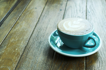 Blue coffee cups on wooden backgrounds with copy space for your text